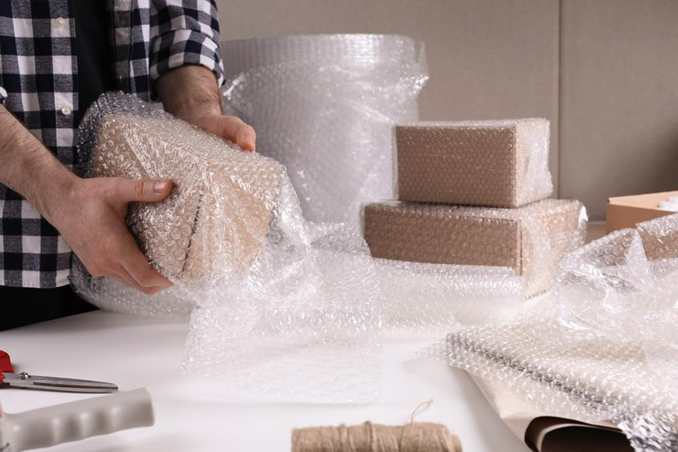 Man Packing Fragile Furniture